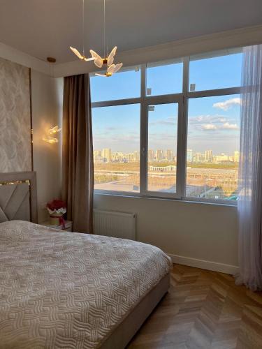 Yesil District Apartment | Вид на Ботанический сад и Астану Арену! Рядом Барыс Арена и Велотрек , мед объекты столицы!