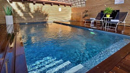 Safed House | פנינת הפסגה - סוויטות בוטיק יוקרתיות