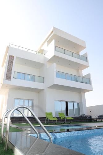 Al Ashkharah House | شالية ماربيا الاشخرة Marbella Ashkhara Chalet