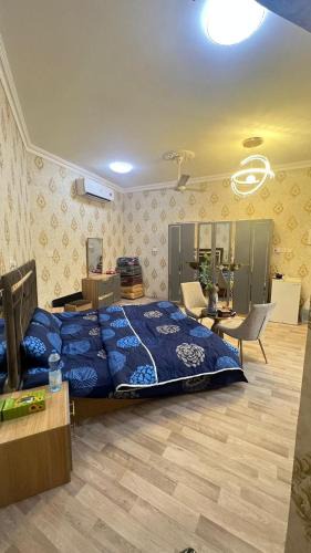 Al Koudh Apartment | غرف نوم في الخوض