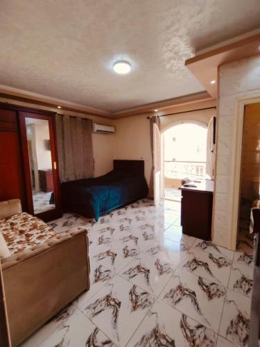 6th of October City House | غرف و استديوهات منفصلة مفروش غرفة ماستر بحمام ومطبخ صغير لا يتشارك مع الغير اي شيء بنات فقط أو عوائل