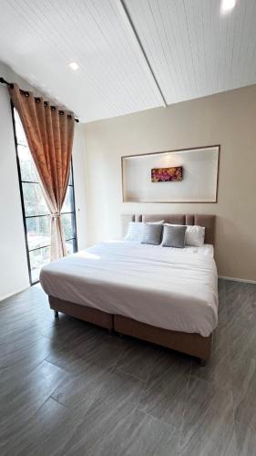 Racha Thewa Ski Chalet | บ้านต้นลมสุวรรณภูมิ Baantonlom suvarnabhumi