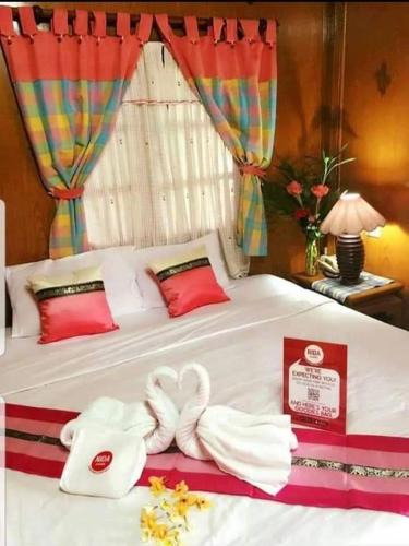 Lan Dokmai Tok Hotel | โรงแรมอัมพรรีสอร์ท