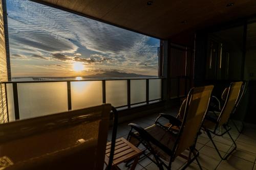 Nishi Ward Apartment | みらいステイKAWACHI サウナspaや温泉付き-絶景オーシャンビューを満喫