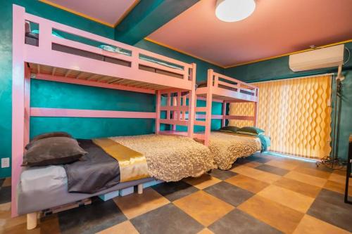 Maeganeku Apartment | シートピア恩納村 徒歩3分でビーチへ 6名宿泊可能 空港直通バス停目前で便利