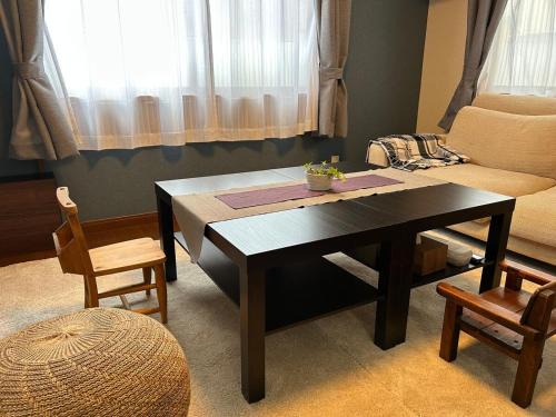Takuma Apartment | 島めぐりに便利な一棟貸切宿あぽわん