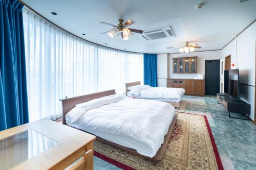 Awase Apartment | 最大20名宿泊可能 大型テレビでスポーツ観戦 グループ旅行に最適 KOEI HOUSE in AWASE