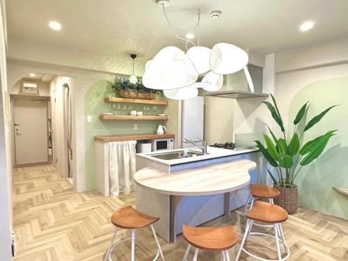 Yonabaru Apartment | 海の見える高層階グループファミリー歓迎コストコ近くthe琉球タワー7A