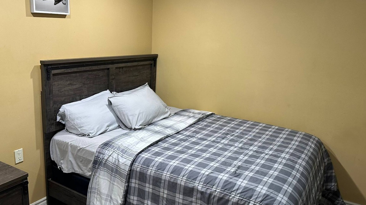 Brampton House | 1 bedroom basement suite with spacious living room and laundry, no kitchen.