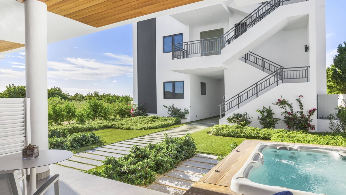 West End Village Condo | 1-BEDROOM + KITCHEN, HOT TUB AT TOP-RATED TRANQUILITY BEACH ON MEADS BAY BEACH