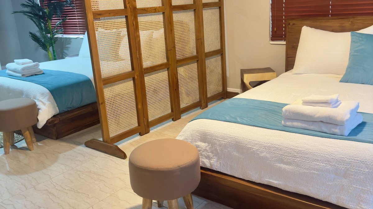 Bahamia West House | 1 King Bed & 2 Queen Beds 1.5 miles from the beach
