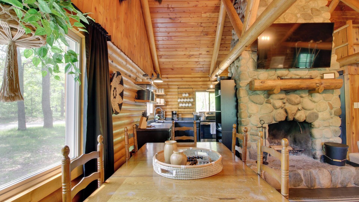 Breezy Point Cottage | 1 Mi to Beach & Lake: Breezy Point Cabin w/Yard!