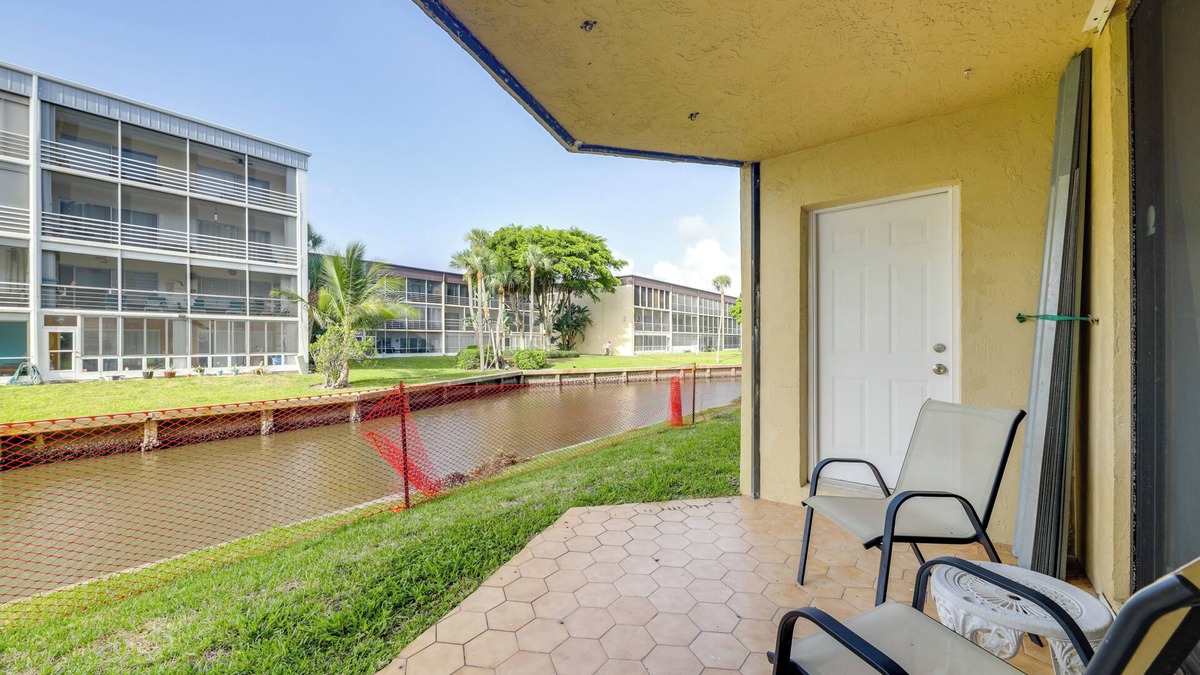 Island Estates Condo | 1 Mi to Lantana Beach: Canal-View Condo w/Pool