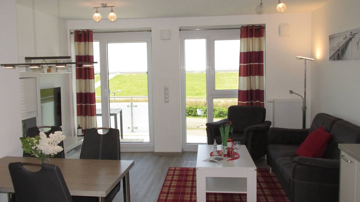 Wurster Nordseekuste Apartment | 100 m from the sea, family-friendly apartment with sea views & swimming pool use