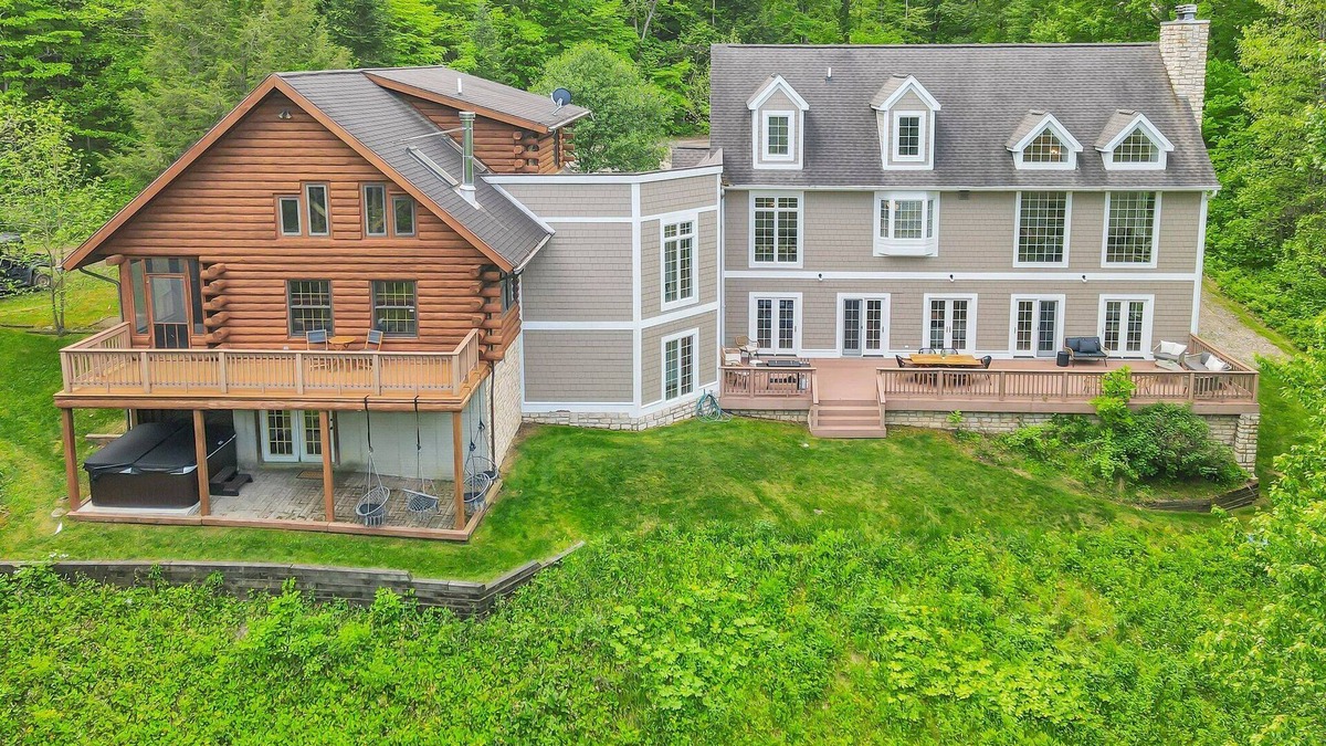 Logan Villa | 11,000sqft sleeps 29, POOL! lake swimming & fishing, hot tub, sauna, 130 acres!