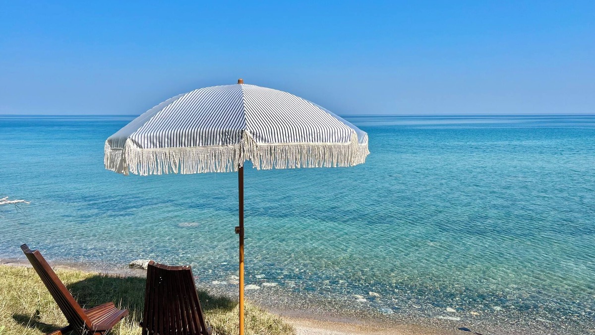 Cheboygan Cottage | 125 ft of Private BEACHFRONT with large, secluded yard & spectacular views!