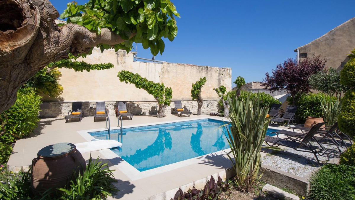 Argyroupoli Apartment | 14th century Venetian open plan stone suite with sharing pool & private terrace