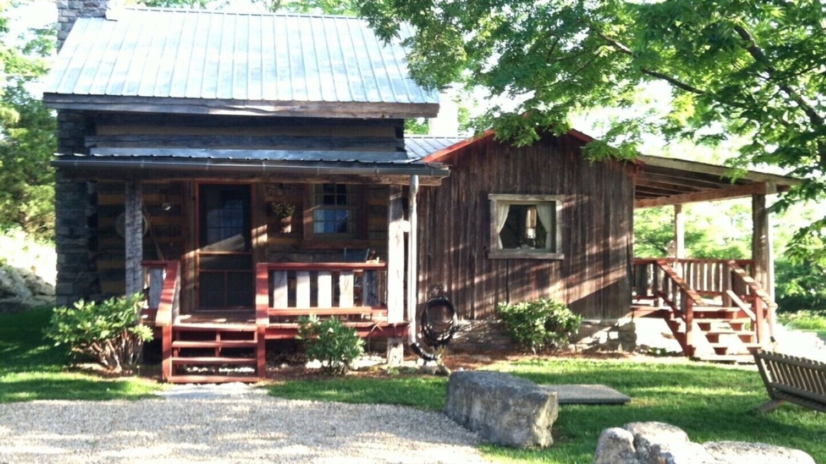 Madison Cabin | 1800’s restored log cabin on 26 private rolling wooded acres with sunset views