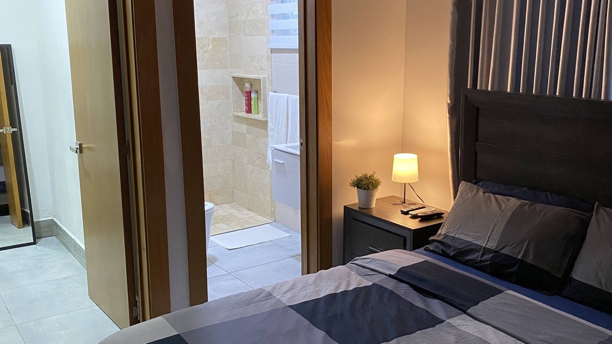 Ensanche Quisqueya Condo | 1Br- LUX Location, Pool, Sauna, GYM -no need car for accommodation-