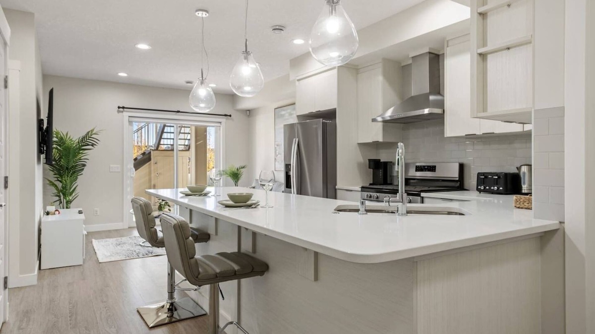 Sage Hill Apartment | 1BR Walk Out Suite » Backyard » Patio » 65” TV