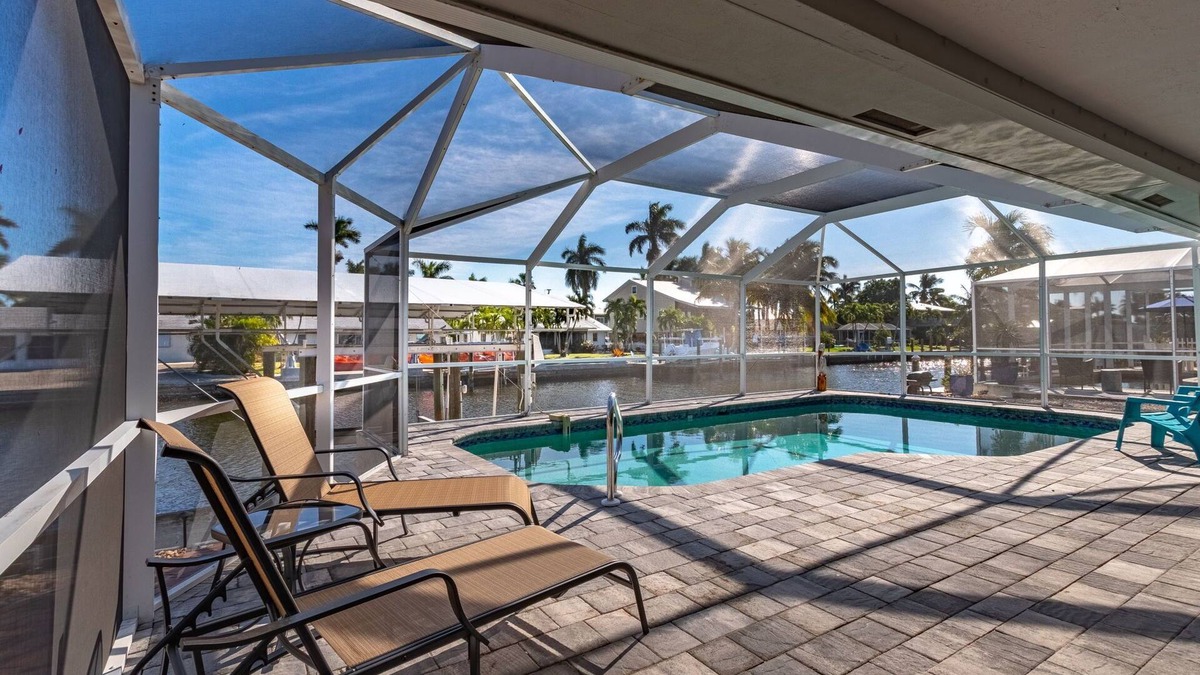 Saint James City House | 2/2 Pool Home on the Water, Boat Lift Included!