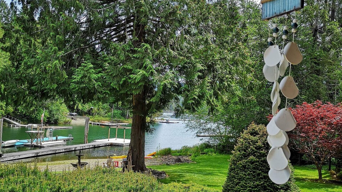 Sproat Lake House | 2.4 acres Lakefront. Full South Exposure: Large Beach