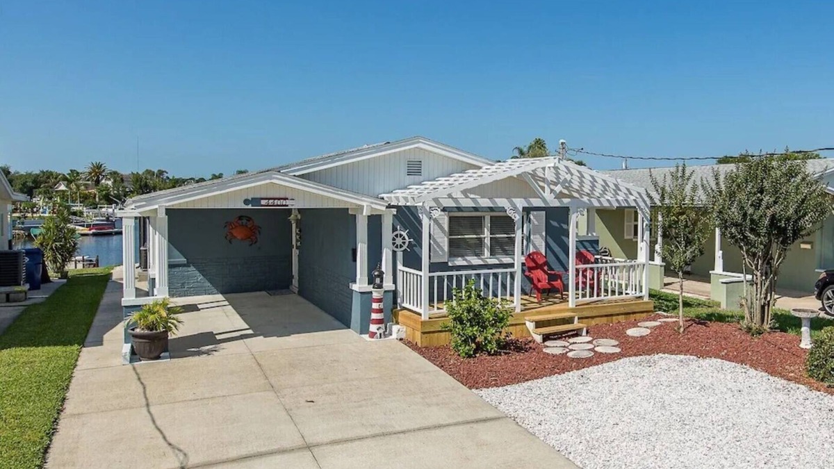 Flor-a-mar House | 2 BED 2 Bath HOME ON THE WATER - HEATED POOL ~ SUPs ~ KAYAKS ~ FISHING POLES!