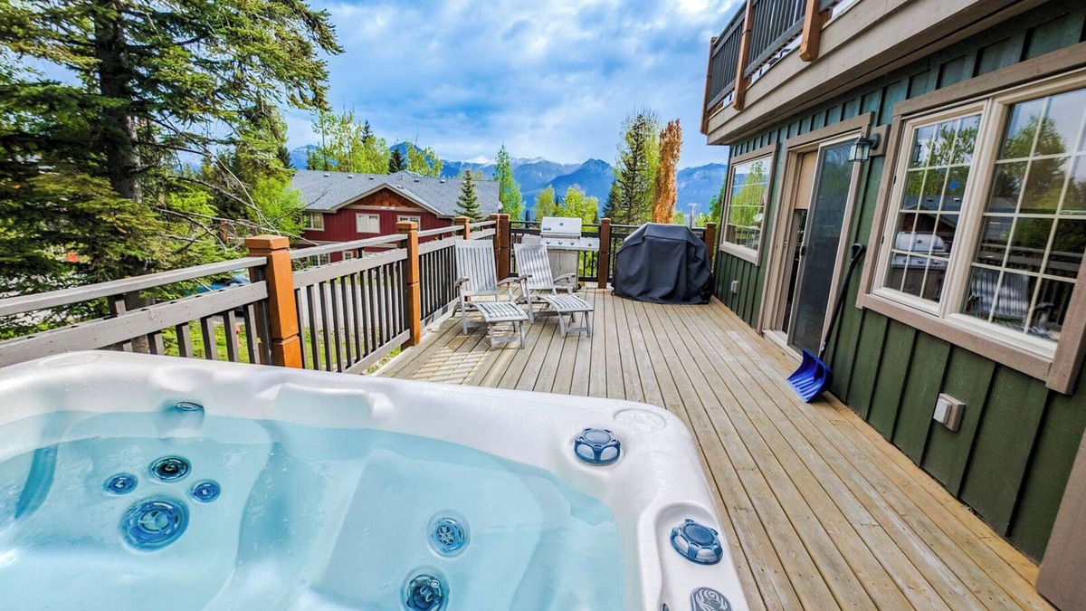 Golden Condo | 2-bedroom condo with hot tub and mountain views