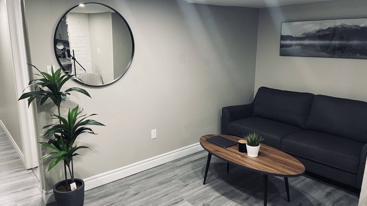 Beaconsfield Village Apartment | 2 Bedroom Cozy Basement Apartment, Separate entrance + free Parking