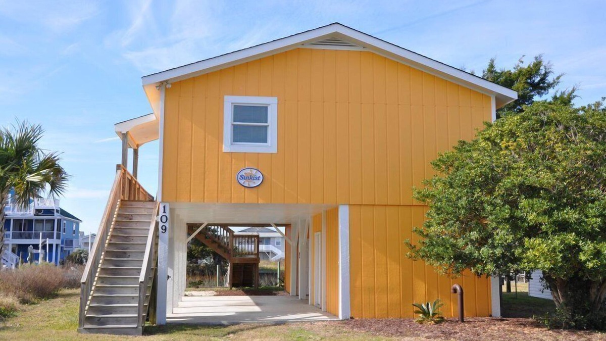 Holden Beach House | 2 bedrooms, 1 bathroom. Pet friendly with a fenced in back yard. Located on canal with dock the perfect place for fishing, crabbing, or docking your boat.
