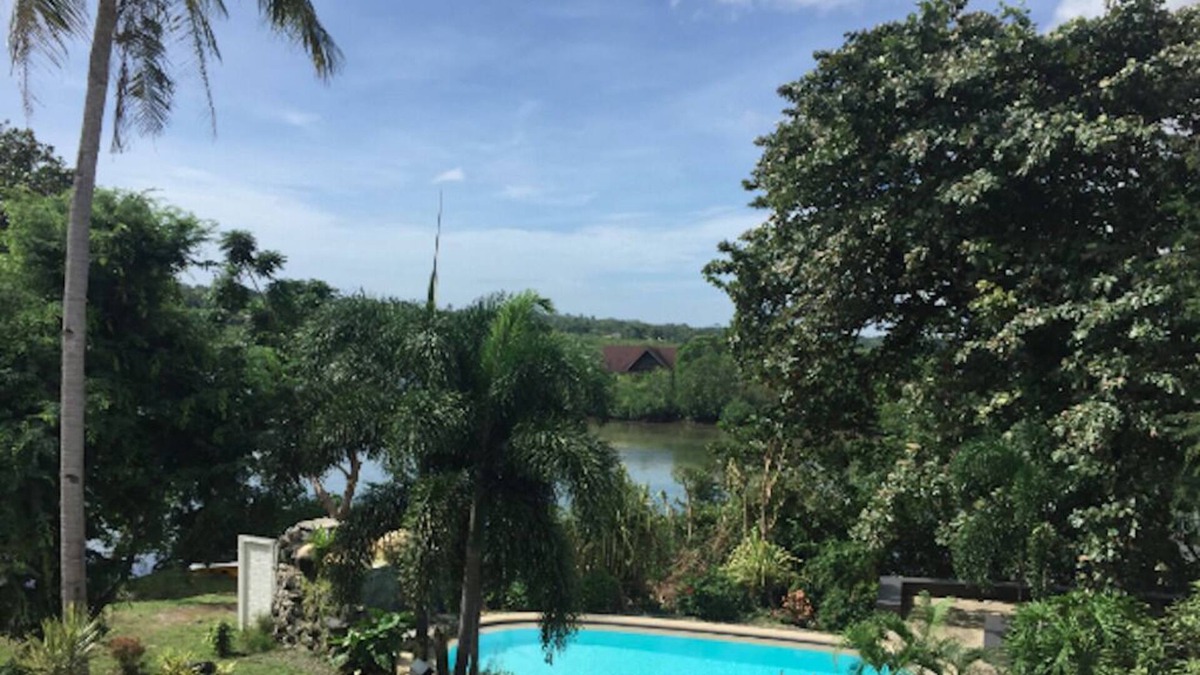 Dauis House | 2 Storey Town House on Lake with Pool in gated secure community.