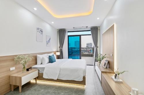 Tay Ho Hotel | 22Land Cosmos Hotel