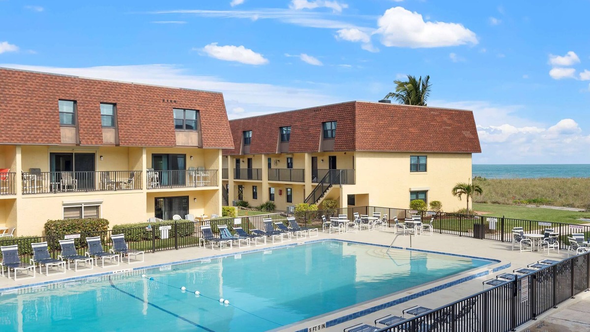 Avon By The Sea Condo | 2BR Sleeps 6 Pool BBQ Steps to Beach Pier Downtown