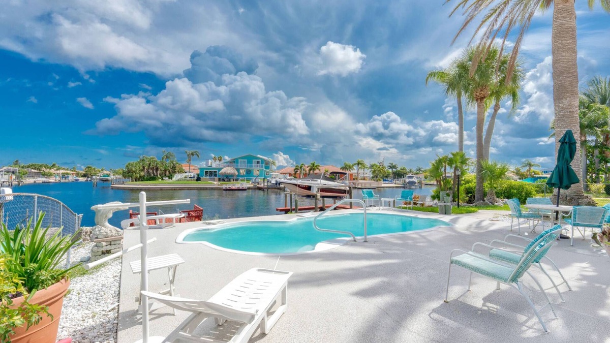Gulf Harbors House | 3/2 Waterfront Canal Home w/Private Pool, Kayaks, Gulf Access, Dock, Fishing, Dolphins