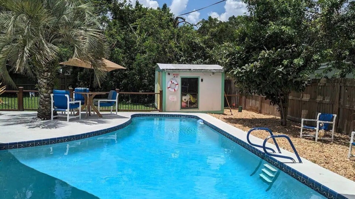 Cocoa House | 3 bed/2 bath house with tropical backyard, pool, fenced yard, hammock