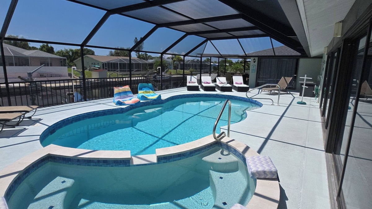 Englewood South House | 3 Miles from Beach! Beautiful Canal Home, 3 Bed/3 Bath, heated pool and spa