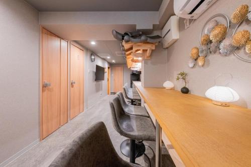 Higashishinsaibashi Apartment | 4階 ホテル福 道頓堀に位置する宿 ベッド9台 シャワー2台 観光に最適