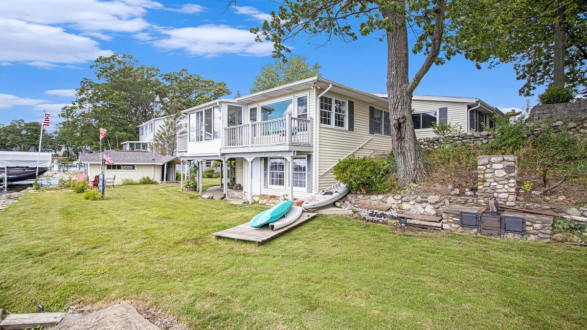 Plainwell House | 4 bedroom lakefront house on Pine Lake! Sunrise and Sunset views!