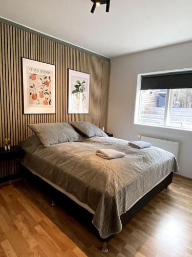 Grafarholt Apartment | 4-room spacious condo w patio