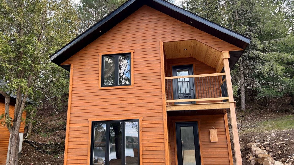 Bowman Ski Chalet | [# 4 The Raven] Chalet on the banks of the river.