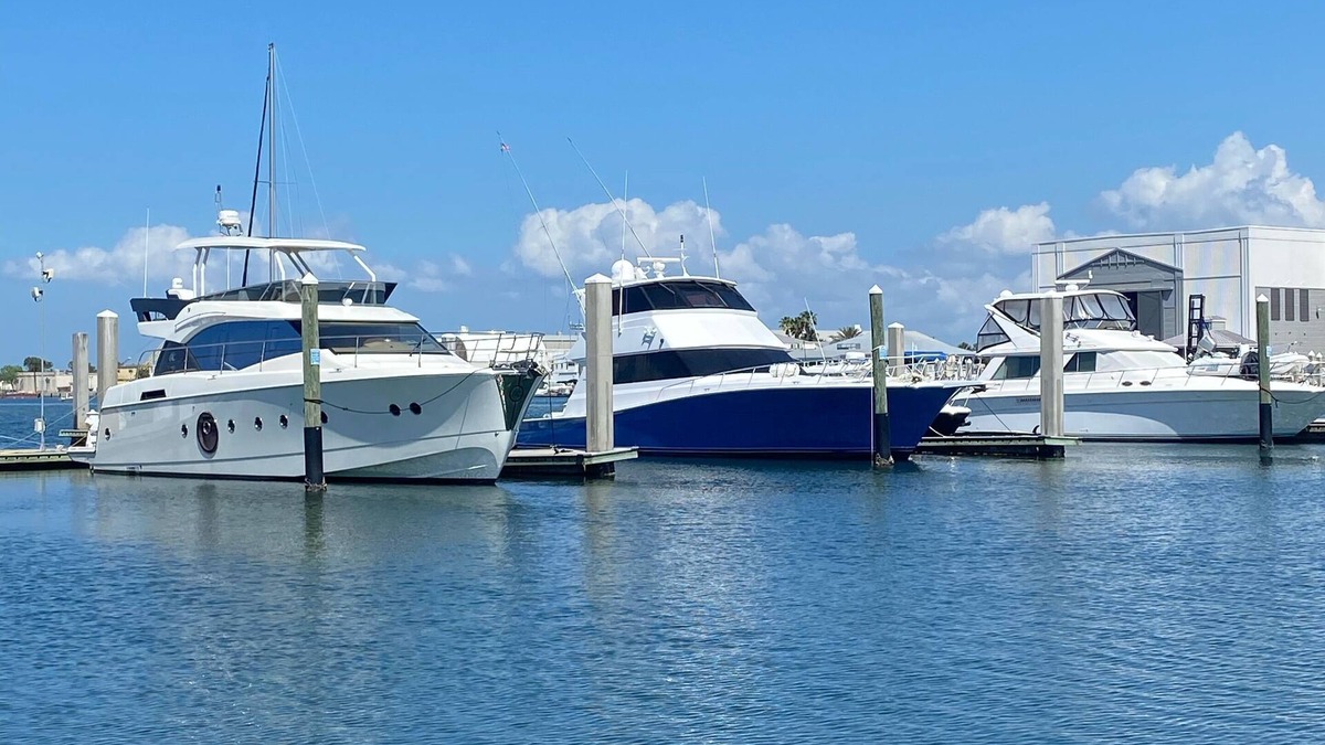 Tampa Boat Rental | 48’ Hattaras Sport Yacht onTreasure Island inter coastal near johns pass village