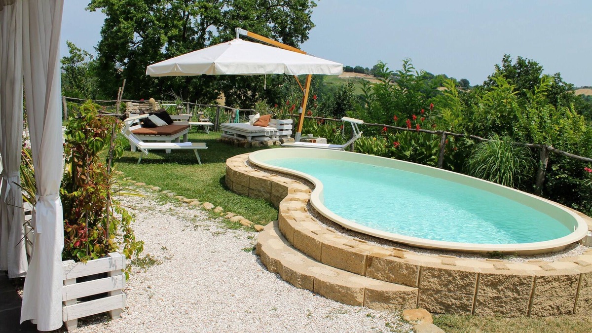 Monteciccardo Apartment | 5-bedroom holiday apartment: nature, swimming pool, relax 30 mins from the beach