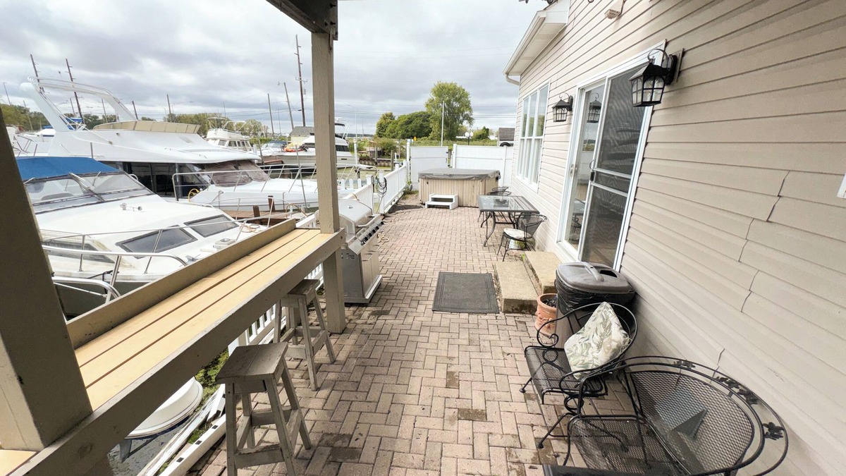 Anchor Bay Harbor Boat Rental | 50ft Stationary House Boat with Upper Sun Deck