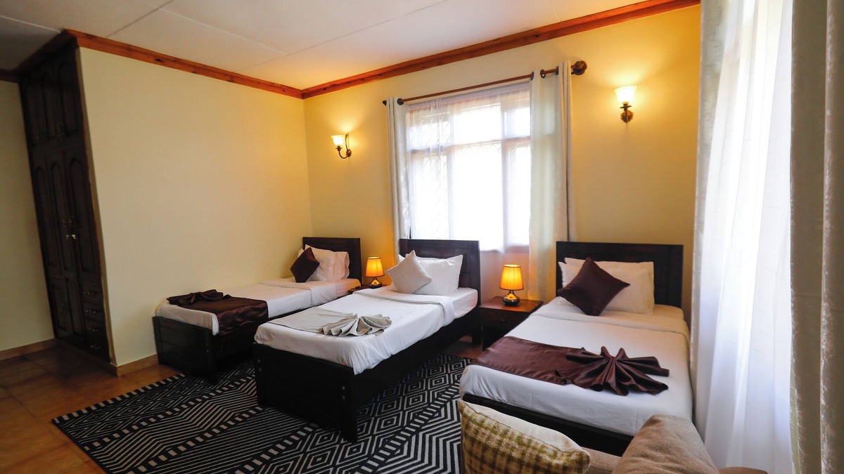 Arusha Cabin | 6-bedroom lodge in charming Arusha with AC, WiFi. Enjoy a cozy stay