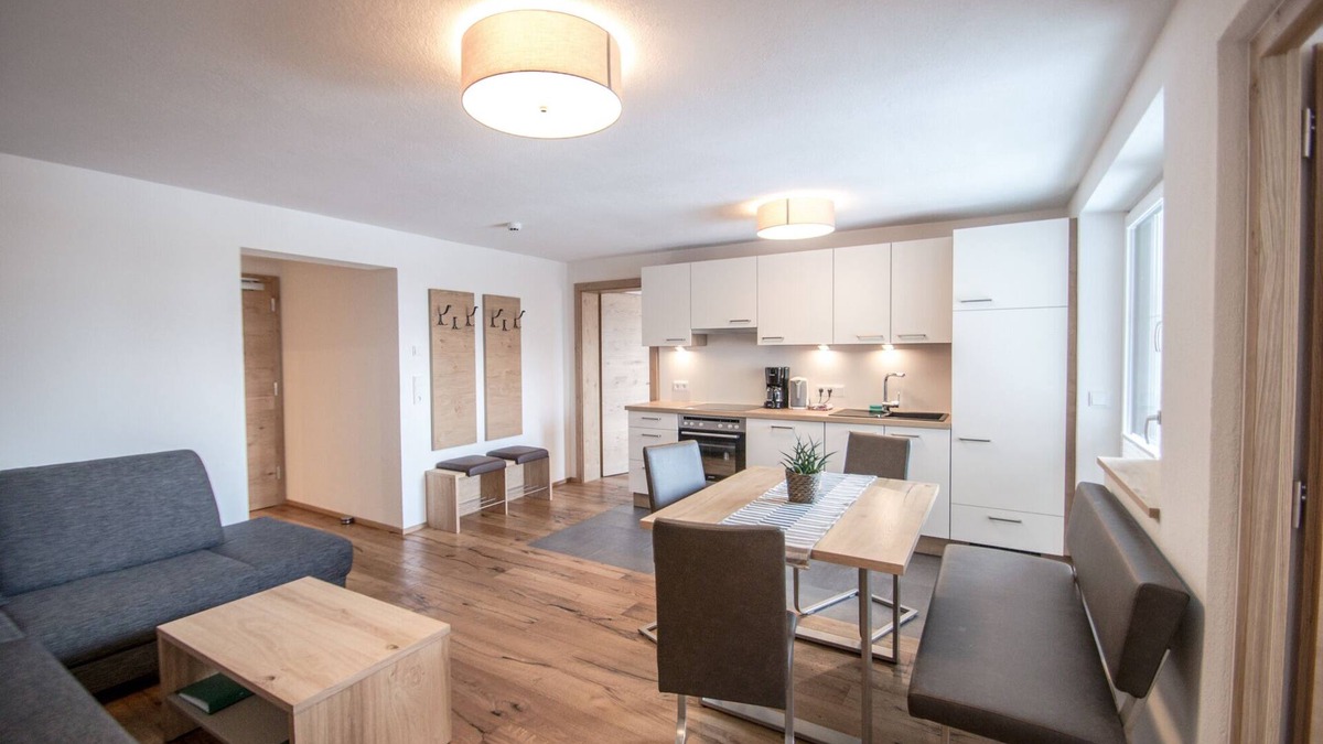 Bichlbach Apartment | 60 m² modern vacation apartment with balcony, free bathing lake, 100 m to the ski area