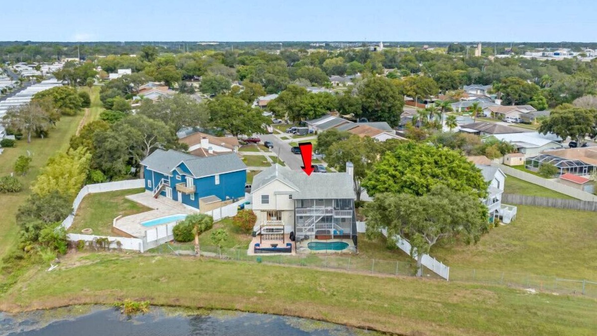 Largo Villa | 6BR Waterfront Heated Pool Hot Tub Game Room Firepit
