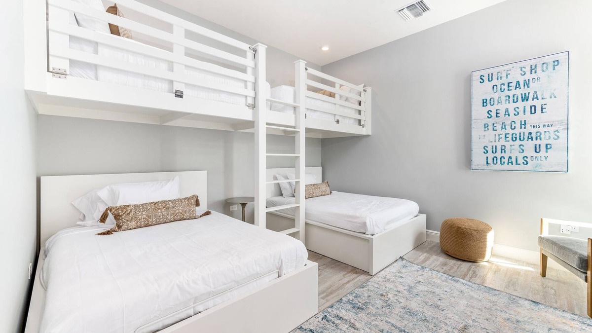West Bay Condo | 7 Mile Luxury Beach Club. Ocean views from Roof Terrace and Pool Pavilion.