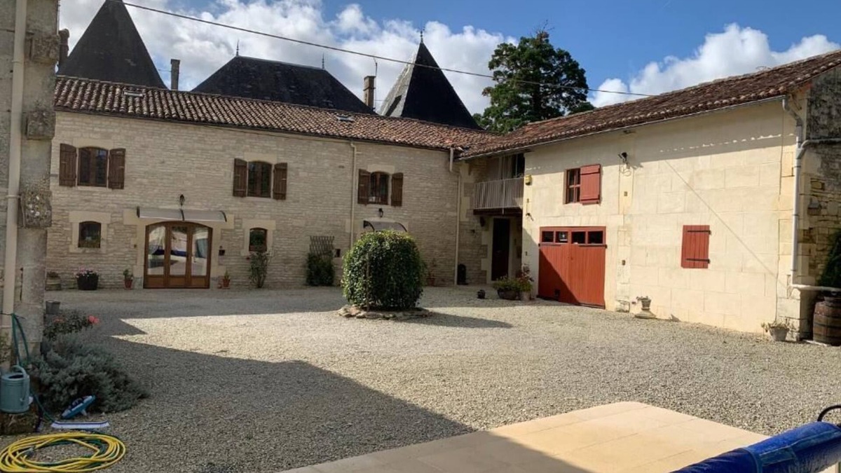 Aujac House | A beautiful, twin towered, Charente-Maritime house