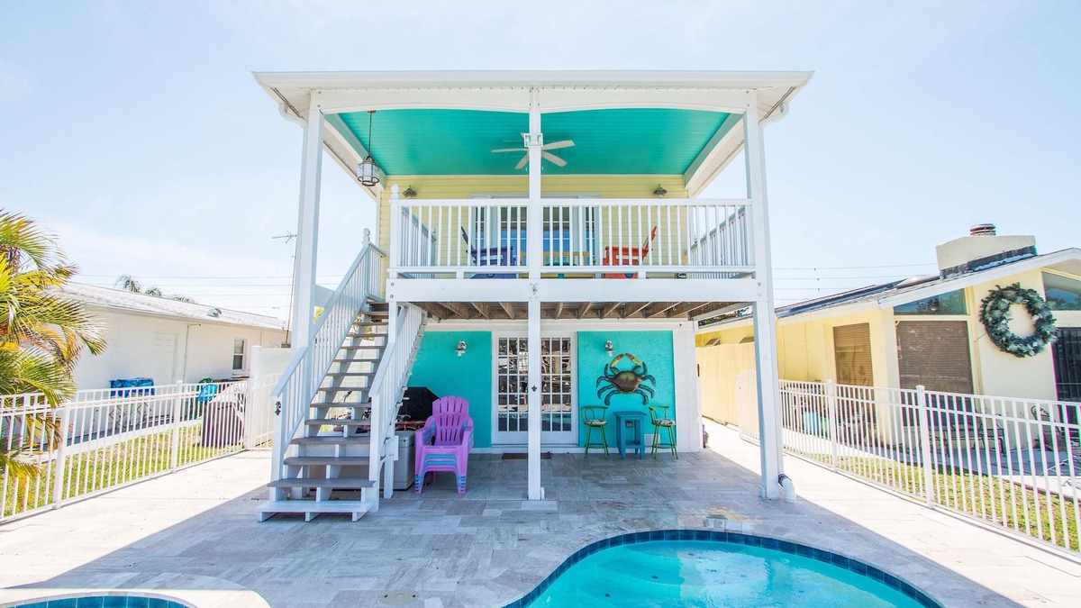Flor-a-mar House | A bit of Key West in New Port Richey: Bright Home w/Pool & Boat Dock Access!