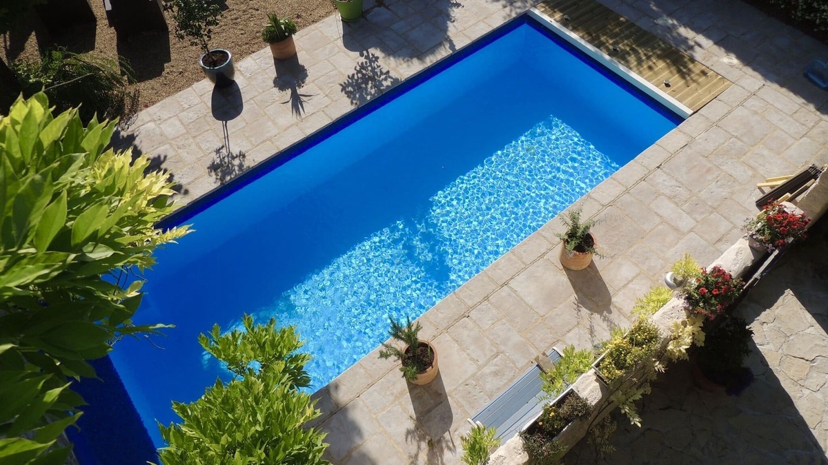 Neffies House | A character stone house with private heated swimming pool.